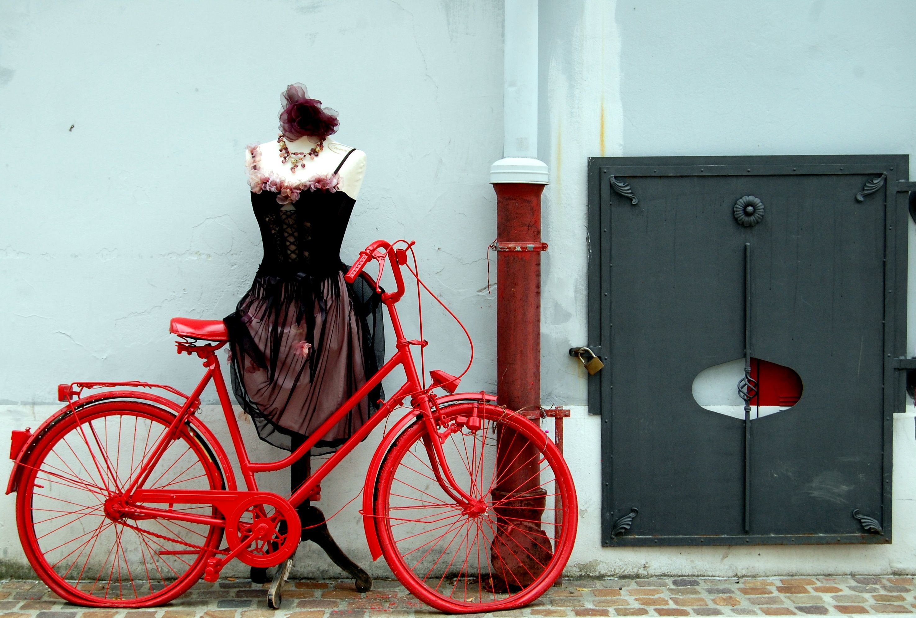Red bike and lady in black